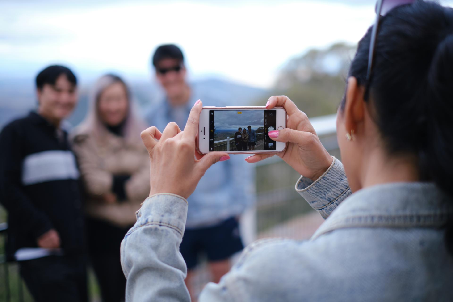 Students taking a picture at Picnic Point in Toowoomba. 