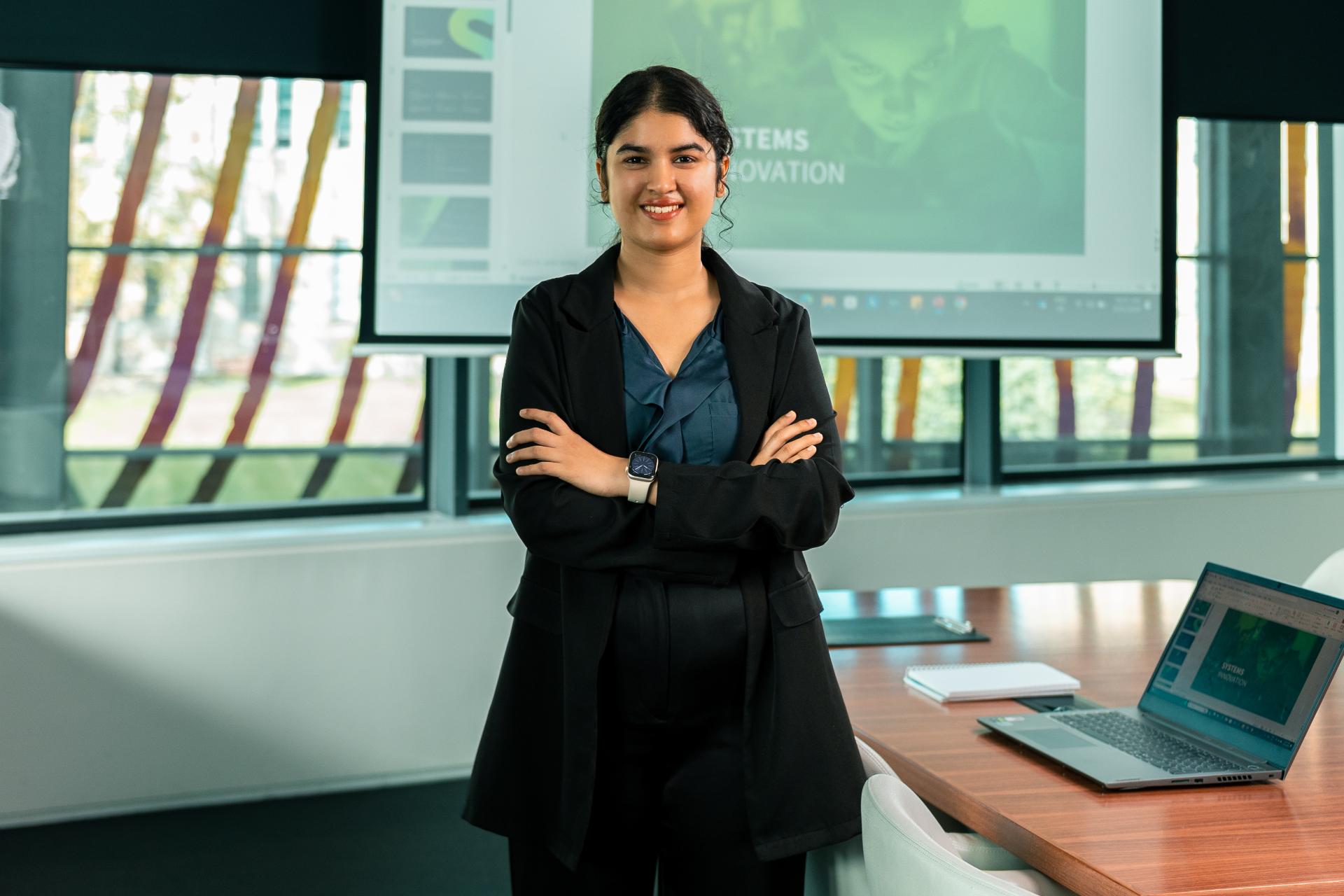 Female student in a business setting. 